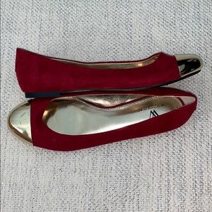 Red flats with gold shiny toe